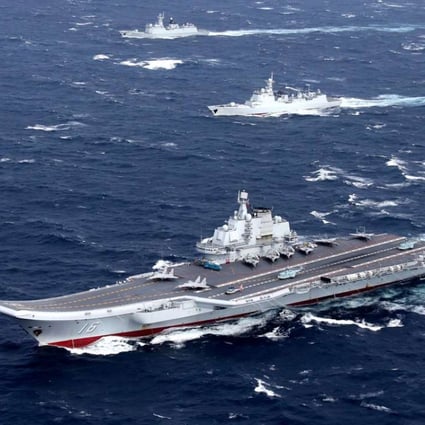 A file picture of China's sole aircraft carrier Liaoning taking part in a drill last month in the South China Sea. Photo: Reuters