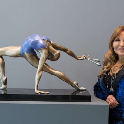 Carole A. Feuerman with a sculpture from her dance series. Photos: Carole A. Feuerman