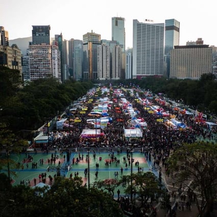 Hong Kong people throng the Victoria Park New Year flower market on January 27, on the eve of the Lunar New Year holiday. Victoria Park already offers a comfortable pedestrian path network and an abundance of sports and recreational facilities. Photo: AFP