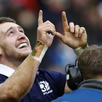 Scotland's Stuart Hogg celebrates after scoring his second try. Photo: Reuters