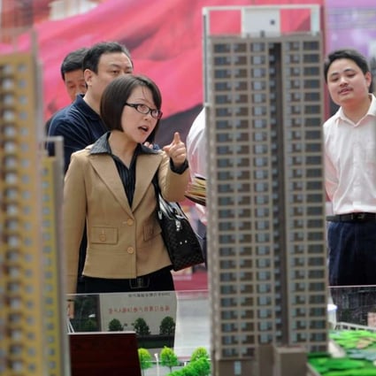 Visitors at a real estate exhibition on the first day of May Day holiday in Hefei. Prices of new homes surged by as much as 46.5 per cent last year in the Anhui provincial capital city, according to statistics bureau data. Photo: Xinhua
