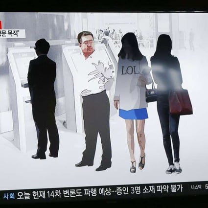 South Korean TV shows a dramatisation of the attack. Photo: EPA