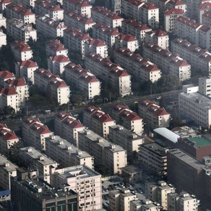 Shanghai’s January new home prices fell 0.1 per cent from a month earlier, reflecting the effectiveness of government curbs on speculative buying. Photo: AFP