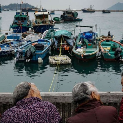 Women chat at the Cheung Chau harbourfront. Hong Kong is a microcosm of the grossly unequal reality we see globally, with the richest 10 per cent of the city’s households earning 29 times more than the poorest 10 per cent. Photo: AFP