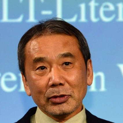 Japanese writer Haruki Murakami posing for photographers prior to an award ceremony for the Germany's Welt Literature Prize bestowed by the German daily Die Welt, in Berlin. Photo: AFP