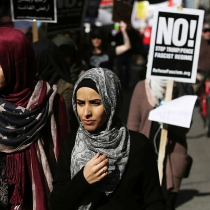 Muslim women protest against US President Donald Trump on February 19 in Chicago, Illinois. Anti-Muslim ideologues have for years treated Islam as a non-religion that threatens American life and law through a violent ideology of sharia. Photo: AFP