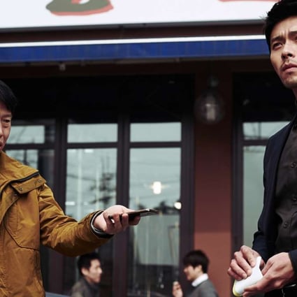 Hyun Bin (right) and Yu Hae-jin in Confidential Assignment (category IIB; Korean), directed by Kim Sung-hoon.