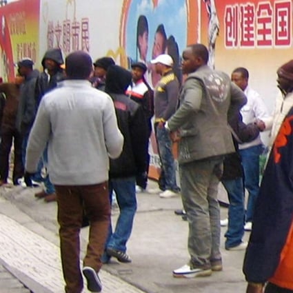 African traders walk on a street in Guangzhou. Photo: Handout