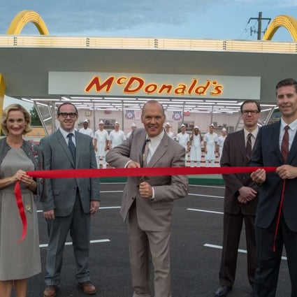 Michael Keaton (middle) as Ray Kroc in the film The Founder (Category: IIA), directed by John Lee Hancock.