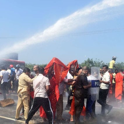 Sri Lankan police use a water cannon to disperse protesters in the southern port city of Hambantota in January. Sri Lankan nationalists, monks and local residents are protesting at the creation of an industrial zone there for Chinese investment. Photo: AFP