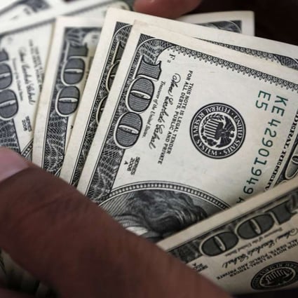 China’s foreign exchange reserves rise unexpectedly in February as government restrictions on capital outflows pushed forex reserves in Beijing back over US$3 trillion. Photo: AFP