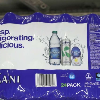 A case of Dasani bottled water moves down a production line at a Coco-Cola bottling plant in Utah. Photo: AFP