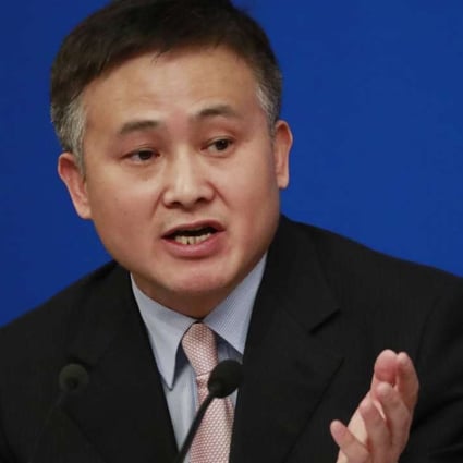 Central bank Deputy Governor Pan Gongsheng said Beijing supported qualified companies conducting “orderly, steadily” overseas investment. Photo: EPA