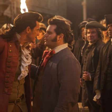 Luke Evans as Gaston (left), with Josh Gad as LeFou, in Beauty and the Beast. Photo: AP