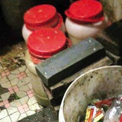 The report showed photos of food items stored in a dirty toilet stall. Photo: Handout
