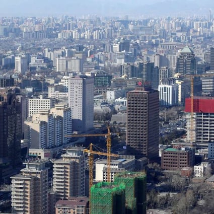 Residential and office buildings in Beijing. The municipal government has raised down payments for most property deals for second home purchases to an unprecedented 80 per cent. Photo: Reuters