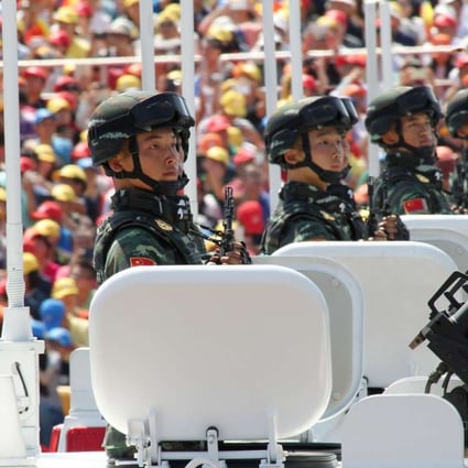 PLA troops pictured taking part in a military parade in the centre of Beijing two years ago. Photo: Simon Song