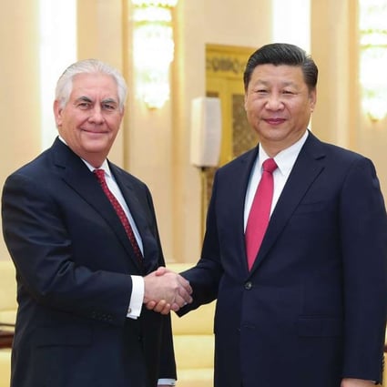 China's President Xi Jinping shakes hands with US Secretary of State Rex Tillerson before their meeting at the Great Hall of the People in Beijing. Photo: AFP
