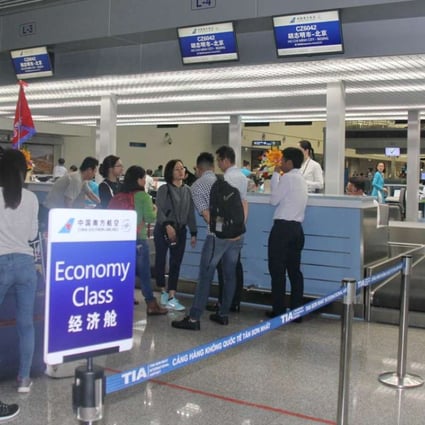 China airline passenger volume during the Lunar New Year holiday was up 15.1 per cent on year. Passengers check in for the debut flight of Southern Airlines from Ho Chi Minh City to Beijing on March 18, 2017. Photo: Xinhua
