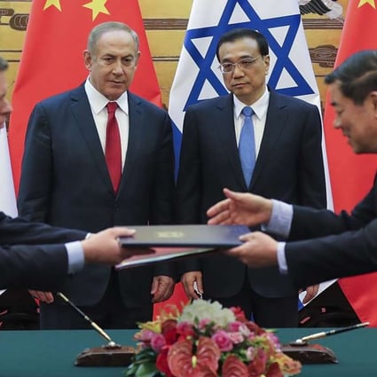 Israeli Prime Minister Benjamin Netanyahu (centre left) and Chinese Premier Li Keqiang (centre right) attend a signing ceremony at the Great Hall of the People in Beijing on Monday. Photo: AP