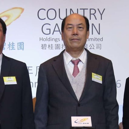 (From L to R) Country Garden president and executive director Mo Bin, founder and chairman Yeung Kwok-keung, and CFO and vice president Wu Bijun, at Wednesday’s results announcement. Photo: David Wong