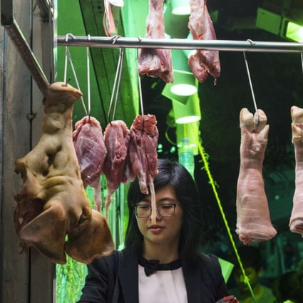 A woman buys meat from a butcher stall in Hong Kong, China. Hong Kong's Centre for Food Safety stated that imports of frozen and chilled meat as well as poultry from Brazil would be temporarily suspended with immediate effect as a precautionary measure due to recent reports of the sale and export of rotten meat by some of Brazil's largest meat producers. Photo: EPA