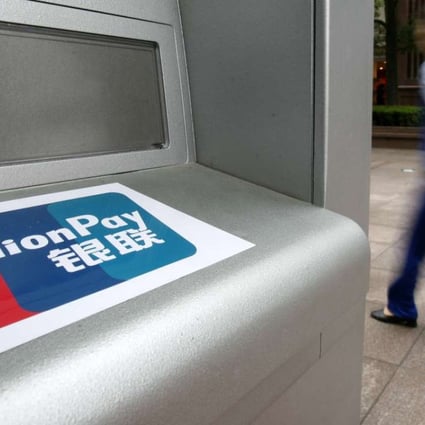 A bank ATM machine with an UnionPay sticker in Shanghai, China. Photo: Bloomberg
