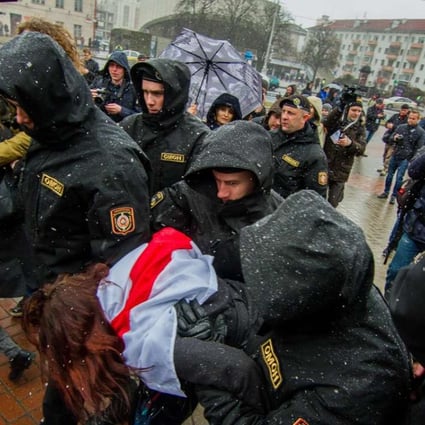 Police officers detain a protester during a rally marking the unofficial Freedom Day in Minsk. Photo: EPA