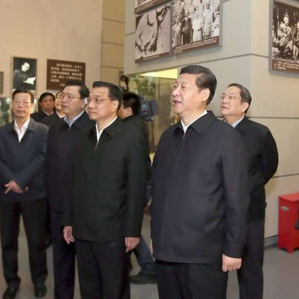 Xi Jinping (front row, second right) and other members of the party Politburo Standing Committee view ‘The Road Towards Renewal’ exhibition at the National Museum of China in Beijing in November 2012. Photo: Xinhua