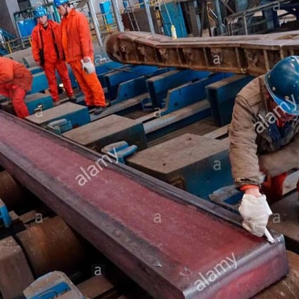 Railway construction is a key element of the One Belt, One Road initiative, and steel mills, such as this one in Dalian, Liaoning, will play an important part in the strategy. Photo: Alamy