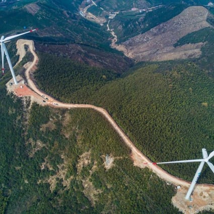 Wind turbines on the hills of Changxing county, Zhejiang province. The world’s second-biggest economy is evolving into the undisputed global leader in the wind and solar sectors, via an unprecedented wave of investment in manufacturing, and technology research and development. Photo: Xinhua