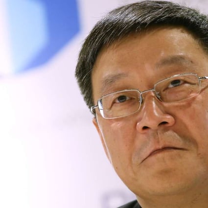 Guotai Junan Securities chairman and executive director Yang Dehong. Photo: David Wong