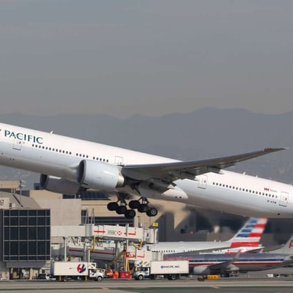 Cathay Pacific passengers will sit 10 to a row under the new arrangement instead of nine. Photo: Shutterstock