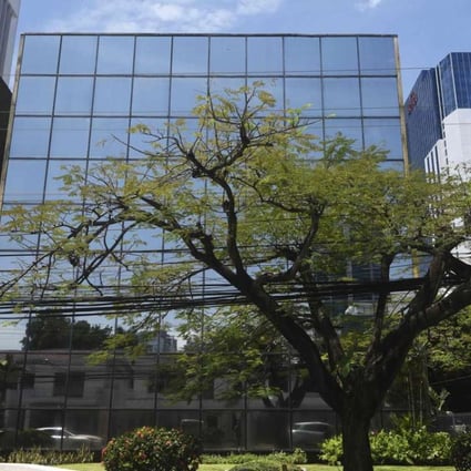 General view of the building where Panama-based Mossack Fonseca law firm offices are located, showing the sign identifying the firm was removed, in Panama City. Photo: AFP