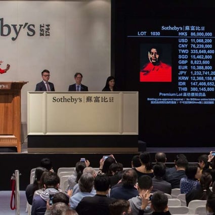 An Andy Warhol Mao goes under the hammer at Sotheby's Hong Kong auction of modern and contemporary art on Sunday. The work sold for less than expected. Photo: Sotheby's