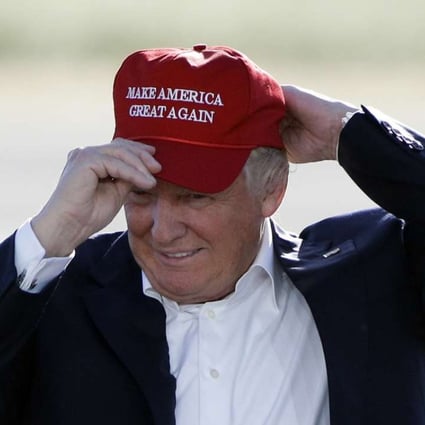 Donald Trump wears a ‘Make America Great Again’ cap at a campaign rally in Sacramento, California, in June last year. Photo: AP