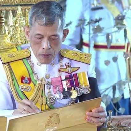 Maha Vajiralongkorn signed the document in a televised ceremony in Bangkok. Photo: Bangkok Post