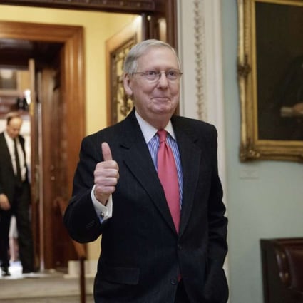 Senate Majority Leader Mitch McConnell signals a thumbs-up as he leaves the Senate chamber on Capitol Hill in Washington, Thursday, April 6, 2017, after he led the GOP majority to change Senate rules and lower the vote threshold for Supreme Court nominees from 60 votes to a simple majority in order to advance Neil Gorsuch to a confirmation vote. Photo: AP