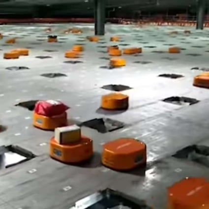The army of little orange Hikvision robots in the sorting centre in STO Express’ delivery warehouse in Hangzhou, Zhejiang province. Photo: Handout