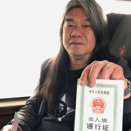 ‘Long Hair’ Leung Kwok-hung with his one-off home-return permit. Photo supplied by lawmaker Shiu Ka-chun.