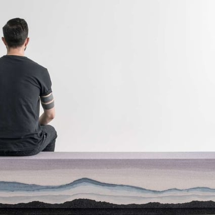This image shows the “Escape” bench. At the 2017 Salone del Mobile in Milan, there was a focus on soft, organic forms with natural curves, such as the silica, hand-dyed sand and powdered glass furniture from Fernando Mastrangelo.