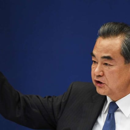 Foreign minister Wang Yi speaks at a press conference at the Ministry of Foreign Affairs in Beijing on Tuesday. Photo: AFP
