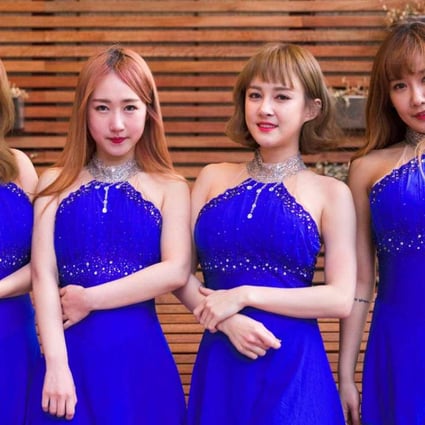 All members of K-pop outfit SixBomb went through extensive plastic surgery, from nose jobs to breast implants, before releasing their new single on March 16. Cosmetic surgery is becoming more popular among young people. Photo: AFP