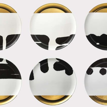 Designer-artist Freeman Lau’s gold and white ceramic plates, decorated in bold ink brushstrokes, are part of a long-term collaboration with master calligrapher Tong Yang-tse from Taiwan.