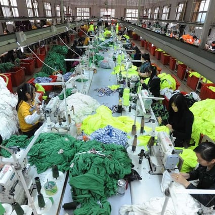 A Chinese and US-owned textile factory in Wuhu, Anhui province. Some manufacturers might be lured back to the United States by lower taxes. Photo: AFP