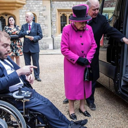 Queen Elizabeth hosts a ceremony to celebrate the 40th anniversary of British charity Motability, at Windsor Castle on April 25. Motability enables those with disabilities, their families and carers to lease a new car, scooter or powered wheelchair using their mobility allowance. Photo: AFP