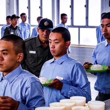 Neo Yau Hawk-sau (second from right) plays a young gang member serving time in With Prisoners (category III; Cantonese), directed by Andrew Wong. The film also stars Kelvin Kwan.