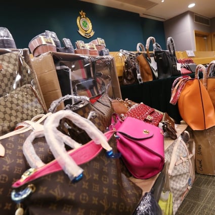 Suspected counterfeit bags seized by Hong Kong customs. Photo: Felix Wong