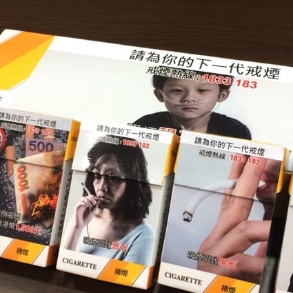 Dummy cigarette packets with the proposed graphic health warnings that cover up to 85 per cent of the surface. Photo: Elizabeth Cheung