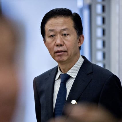 China's finance minister Xiao Jie, pictured last month in Washington, was absent from bilateral meeting with his Japanese and South Korean counterparts in Yokohama on Friday. Photo: Bloomber